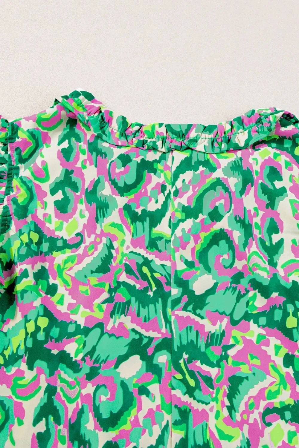 Abstract Print Ruffled Trim Tie Neck Top