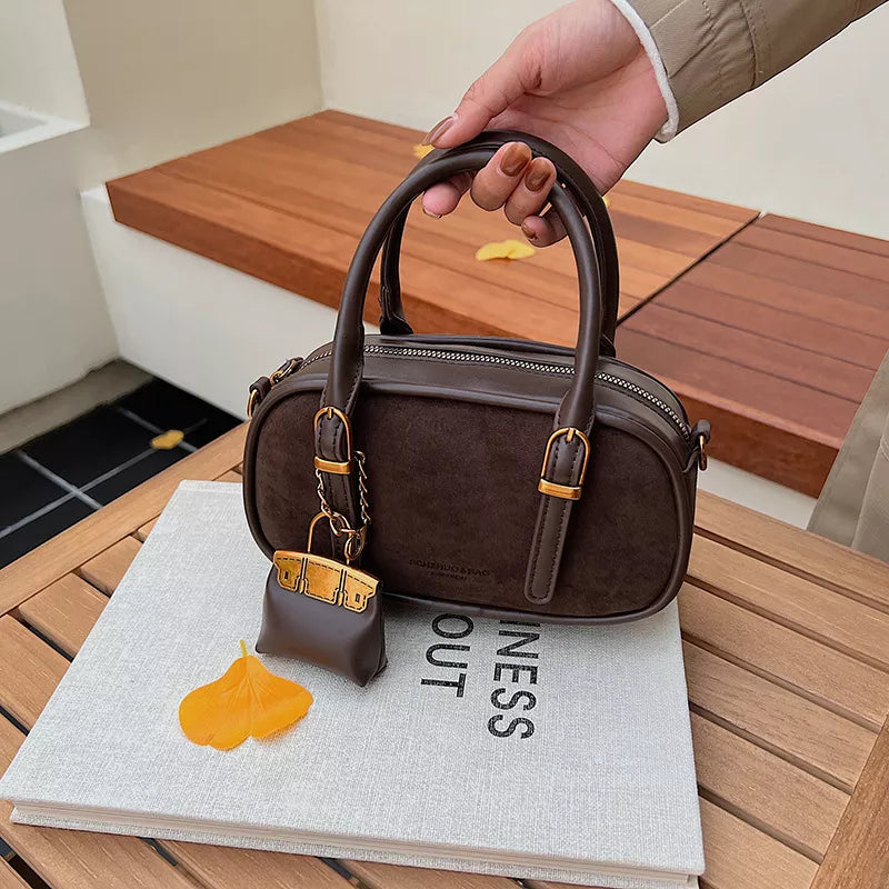Barrel Crossbody Bag with Detachable Charm