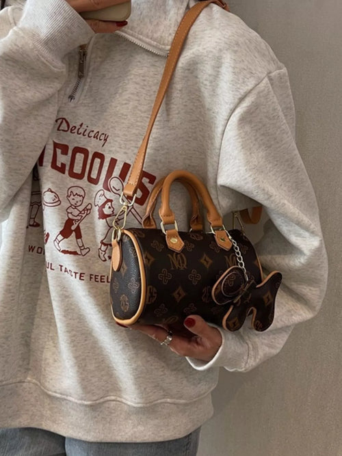 Barrel Crossbody Bag with Charm